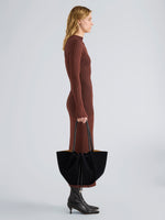 Proenza Schouler Image of model wearing Large Ruched Tote in Suede and Braided Calf in Black