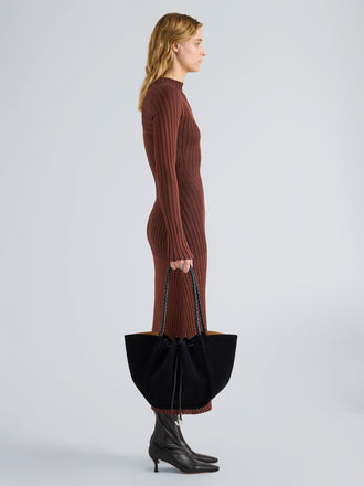 Proenza Schouler Image of model wearing Large Ruched Tote in Suede and Braided Calf in Black