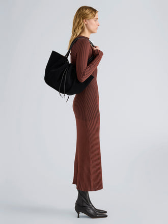 Proenza Schouler Image of model wearing Large Ruched Tote in Suede and Braided Calf in Black