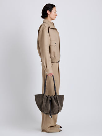 Proenza Schouler Image of model wearing Large Ruched Tote in Suede and Braided Calf in Graphite