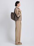 Proenza Schouler Image of model wearing Large Ruched Tote in Suede and Braided Calf in Graphite