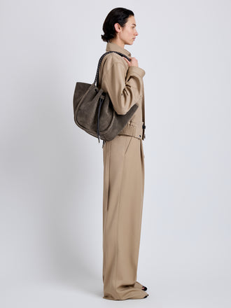 Proenza Schouler Image of model wearing Large Ruched Tote in Suede and Braided Calf in Graphite