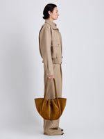 Proenza Schouler Image of model wearing Large Ruched Tote in Suede and Braided Calf in Hazelnut