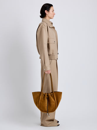 Proenza Schouler Image of model wearing Large Ruched Tote in Suede and Braided Calf in Hazelnut