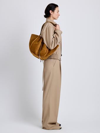 Proenza Schouler Image of model wearing Large Ruched Tote in Suede and Braided Calf in Hazelnut