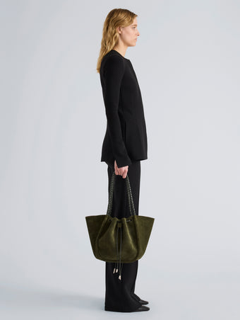 Proenza Schouler Image of model wearing Large Ruched Tote in Suede and Braided Calf in Forest Green