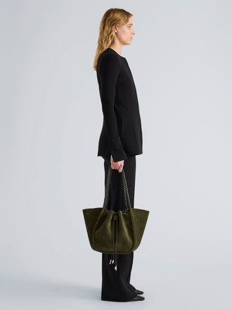 Proenza Schouler Image of model wearing Large Ruched Tote in Suede and Braided Calf in Forest Green