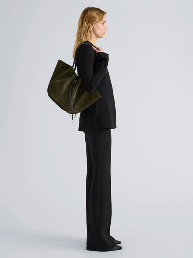 Proenza Schouler Image of model wearing Large Ruched Tote in Suede and Braided Calf in Forest Green