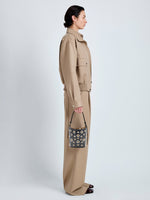 Proenza Schouler Image of model wearing Mini Bucket Bag in Smooth Calf with Grommets in Black