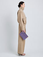 Proenza Schouler Image of model wearing Zip Pouch in Intarsia in CobaltRust Multi