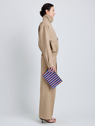 Proenza Schouler Image of model wearing Zip Pouch in Intarsia in CobaltRust Multi