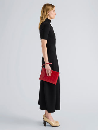 Proenza Schouler Image of model wearing Zip Pouch in Eel in Red