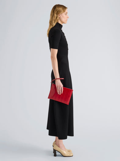 Proenza Schouler Image of model wearing Zip Pouch in Eel in Red