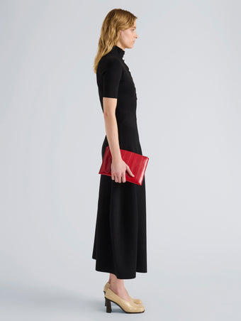 Proenza Schouler Image of model wearing Zip Pouch in Eel in Red