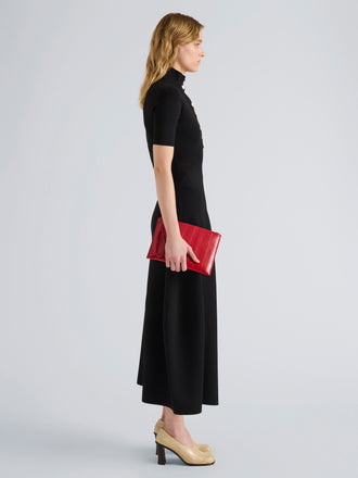 Proenza Schouler Image of model wearing Zip Pouch in Eel in Red