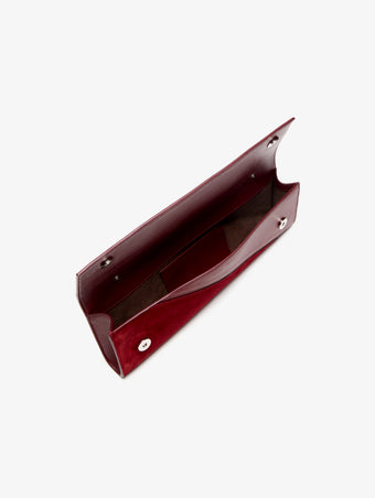 Proenza Schouler Aerial image of Hex Clutch in European Calf and Lux Suede in Madder