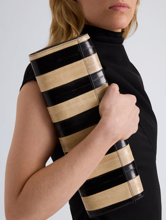 Proenza Schouler Image of model wearing Hex Clutch in Striped Eel in Black Ivory
