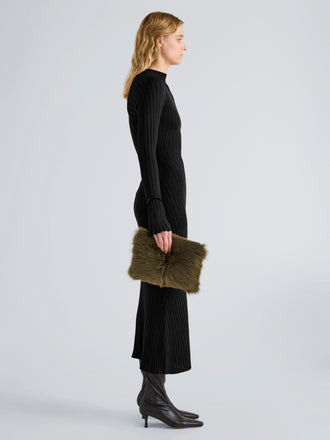 Proenza Schouler Image of model wearing Zip Pouch in Shearling in Khaki
