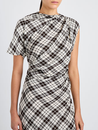 Proenza Schouler detail image of model wearing Hallie Dress in Crinkled Plaid in bark multi