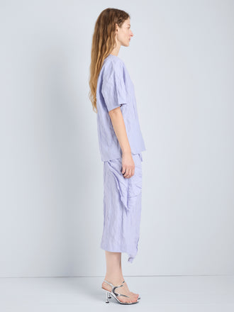 Proenza Schouler Full Length Side Image of model wearing Hansly Top in Memory Cotton in Wisteria