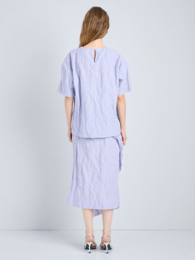 Proenza Schouler Full Length Back Image of model wearing Hansly Top in Memory Cotton in Wisteria