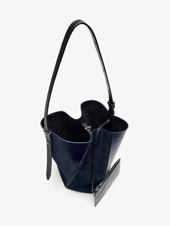 Proenza Schouler Still Life image of Aerial View of Hex Bucket Bag in Haircalf Combo in Deep Navy