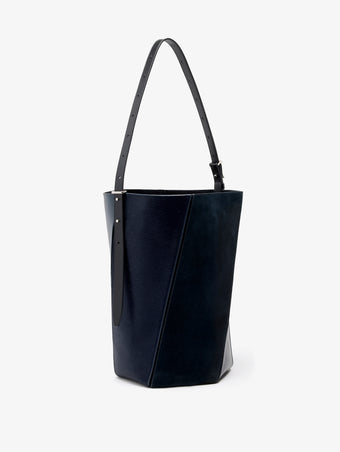 Proenza Schouler Still Life image of Side View of Hex Bucket Bag in Haircalf Combo in Deep Navy