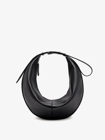 Proenza Schouler Still Life Front Image of Hobo Slide Bag in Pebbled Calf in black with strap shortened