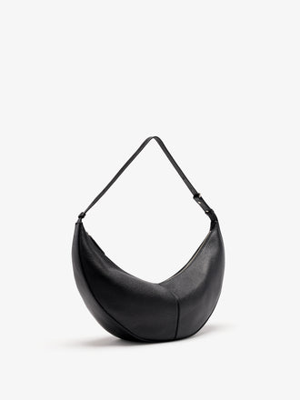 Proenza Schouler Still Life 3/4 Image of Hobo Slide Bag in Pebbled Calf in black