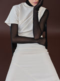Proenza Schouler cropped image of model wearing Hallie Dress in Hammered Viscose in Champagne