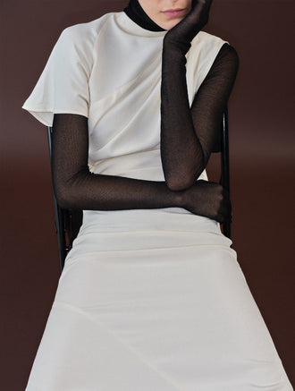 Proenza Schouler cropped image of model wearing Hallie Dress in Hammered Viscose in Champagne