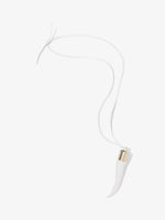 Proenza Schouler flat lay image of Horn Pendant Necklace in white/gold