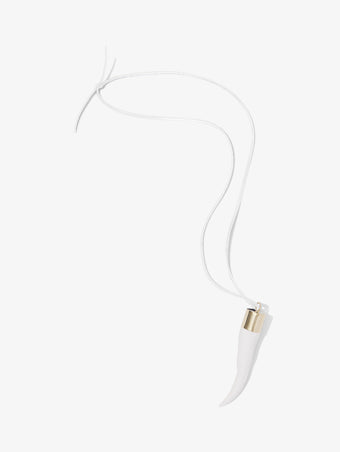 Proenza Schouler flat lay image of Horn Pendant Necklace in white/gold