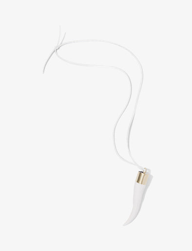 Proenza Schouler flat lay image of Horn Pendant Necklace in white/gold