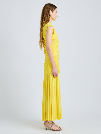 Proenza Schouler Side full length image of model wearing Irma Dress in Gauzy Jersey in Yellow