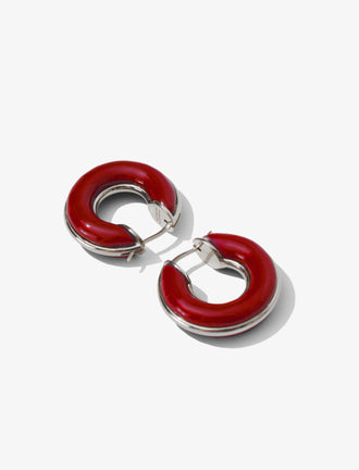 Proenza Schouler Flat lay image of mini hoop earrings in red