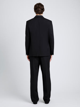 Proenza Schouler Back full length image of model wearing James Jacket in Wool Suiting in Black