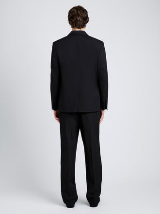 Proenza Schouler Back full length image of model wearing James Jacket in Wool Suiting in Black