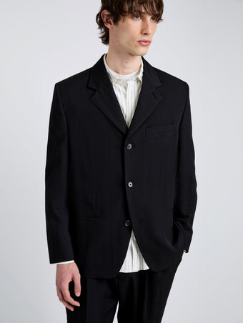 Proenza Schouler Detail image of model wearing James Jacket in Wool Suiting in Black