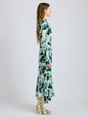 Proenza Schouler Side full length image of model wearing Adela Top in Printed Silk Viscose in Dark Green Multi