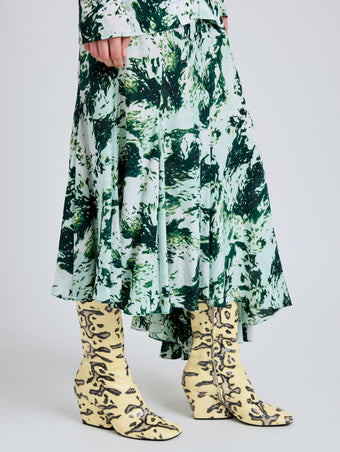 Proenza Schouler Detail image of model wearing Joelle Skirt in Printed Silk Viscose in Dark Green Multi