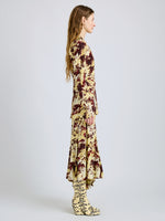 Proenza Schouler Side full length image of model wearing Joelle Skirt in Printed Silk Viscose in Rust Multi