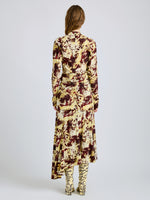 Proenza Schouler Back full length image of model wearing Joelle Skirt in Printed Silk Viscose in Rust Multi