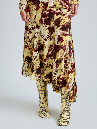 Proenza Schouler Detail image of model wearing Joelle Skirt in Printed Silk Viscose in Rust Multi