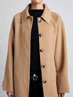 Proenza Schouler Detail image of model wearing Juliette Coat in Brushed Wool in CAMEL