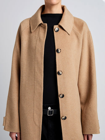 Proenza Schouler Detail image of model wearing Juliette Coat in Brushed Wool in CAMEL