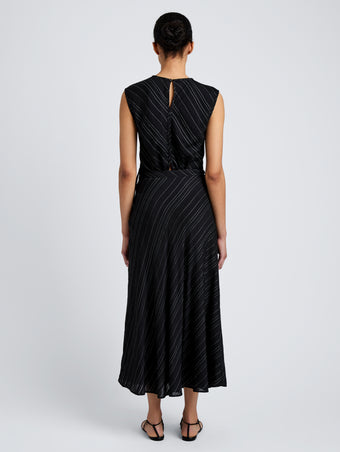 Proenza Schouler back image of model wearing Kaia Skirt in Woven Stripe Flou in black/chalk
