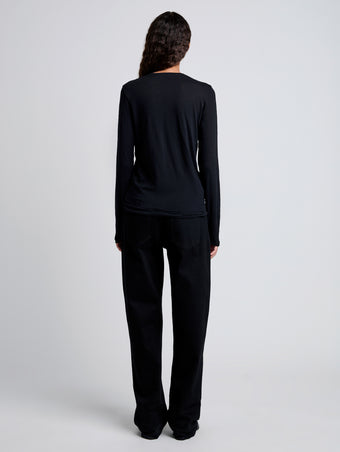 Back image of model wearing Solid Tissue Jersey Long Sleeve Tee in Black