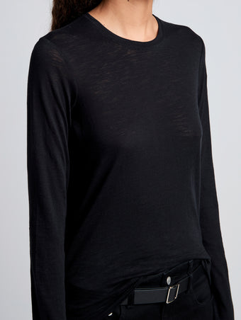Detail image of model wearing Solid Tissue Jersey Long Sleeve Tee in Black