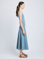 Proenza Schouler Side full length image of model wearing Lucia Dress in Souffle Knit in LARK BLUE